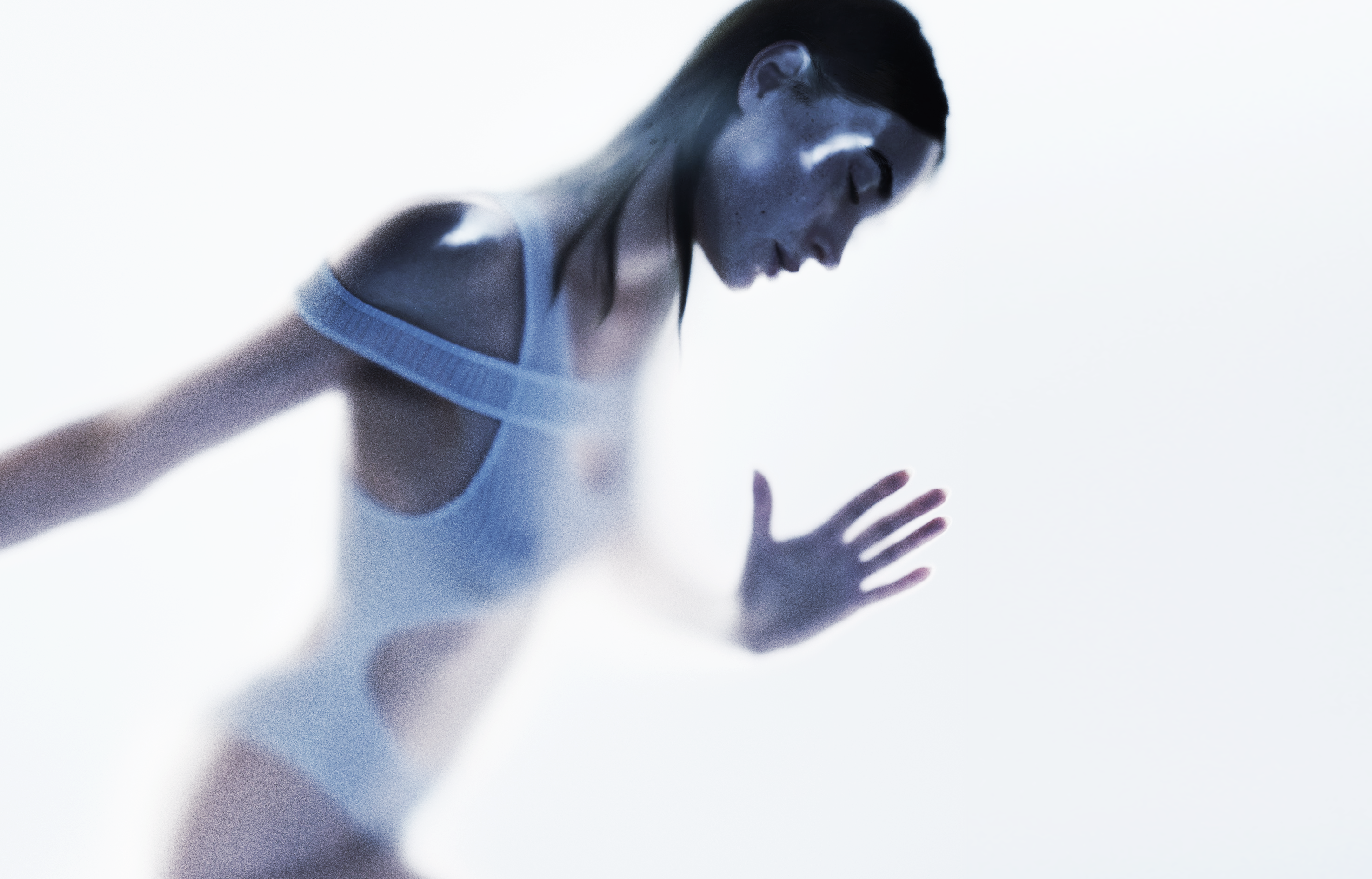 THROUGH A GLASS, DARKLY